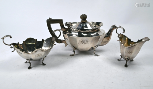 An Edwardian silver three-piece bachelor tea service