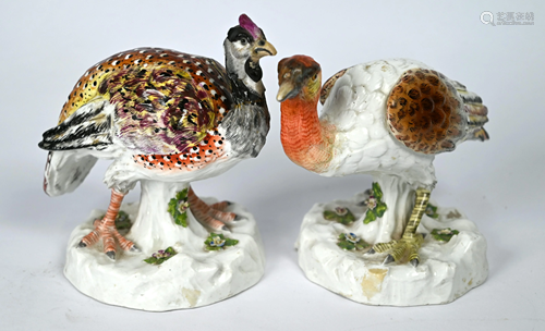 A pair of antique porcelain guinea fowl