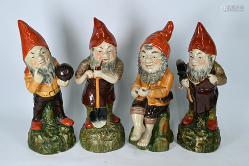 Four large Continental majolica dwarves