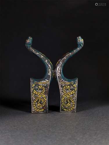 A PAIR OF WARRING STATES INLAYING GOLD AND SILVER BOW HOLDER...