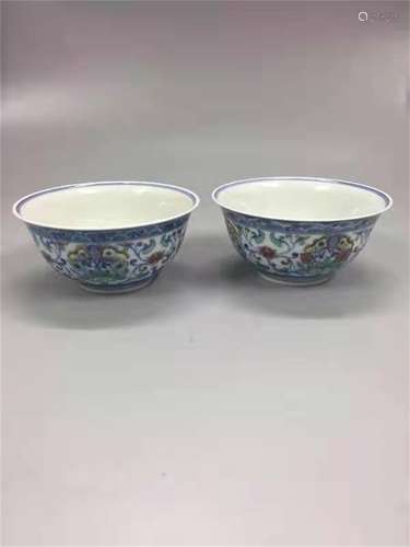 A PAIR OF QING DYNASTY YONGZHENG DOU CAI CUPS