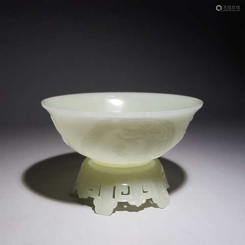 A HETIAN JADE CARVED DRAGON BOWL