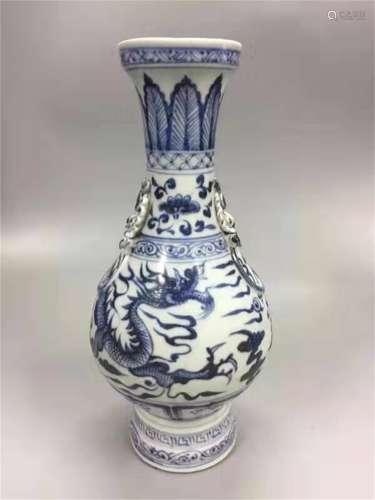 A YUAN DYNASTY DOUBLE EARS DRAGON BOTTLES WITH BLUE AND WHIT...