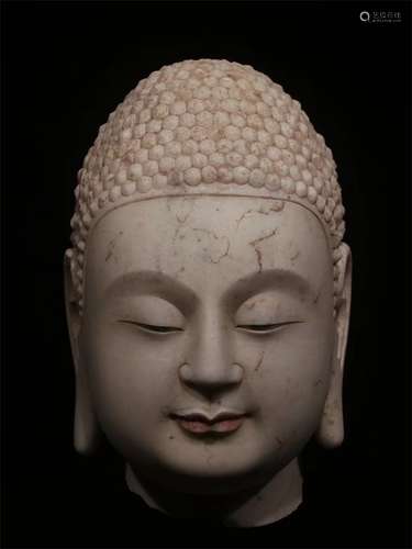 A NORTHERN QI DYNASTY WHITE MARBLE CARVED BUDDHA HEAD