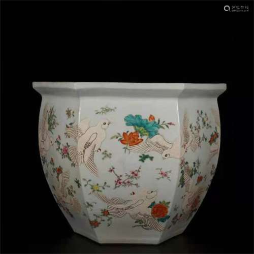 A QING DYNASTY QIANLONG FAMILLE ROSE FLOWER PEACE DOVE HEXAG...