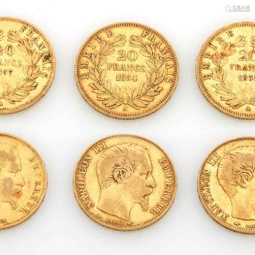 Trois pièces de vingt francs en or à l'effigie de Napoléon I...