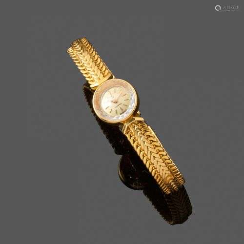 OMEGA. Bracelet montre de dame En or jaune 18k boitier rond,...