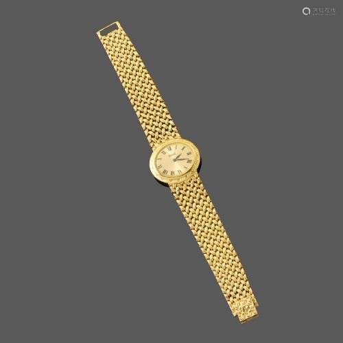 PIAGET. Bracelet montre de dame en or. Cadran ovale plat, fo...