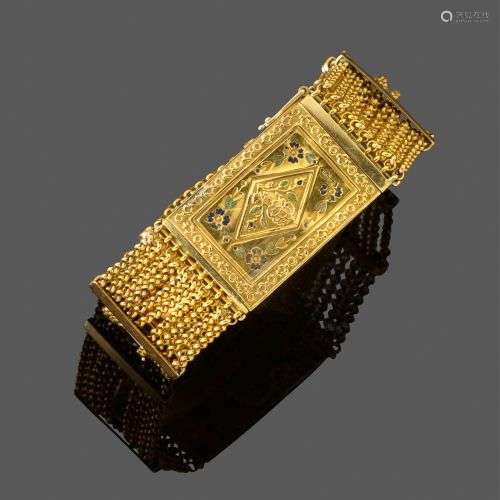 Large bracelet, XIXe siècle. En or jaune 18k, formé de dix c...