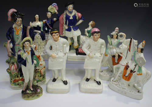 Eight Staffordshire pottery figures, late 19th/early 20th ce...