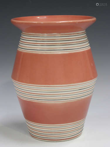 A Clarice Cliff Bizarre vase, 1930s, the salmon pink body wi...
