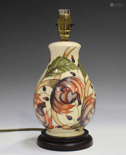 A Moorcroft table lamp base, decorated with peony style flow...