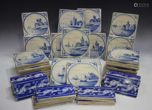 A group of approximately fifty Dutch Delft blue and white ti...