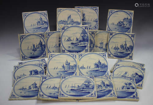 A group of approximately sixty Dutch Delft blue and white ti...