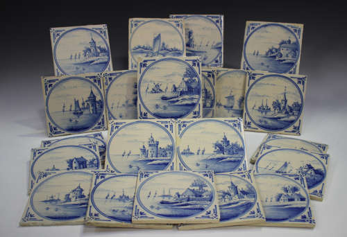 A group of approximately sixty Dutch Delft blue and white ti...