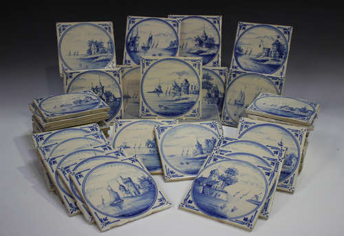 A group of approximately sixty Dutch Delft blue and white ti...