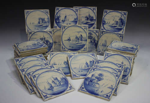 A group of approximately sixty Dutch Delft blue and white ti...