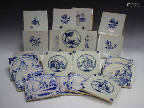 A group of approximately sixty Dutch Delft blue and white ti...