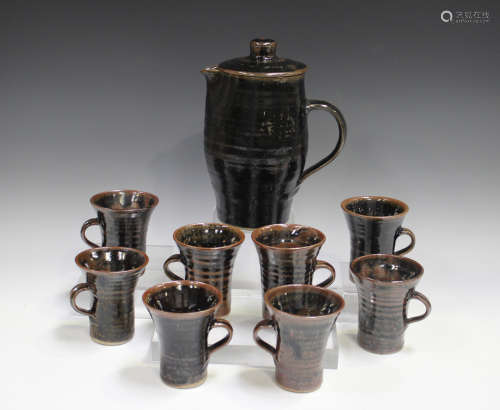 A Jeremy Leach Lowerdown pottery coffee pot and eight mugs, ...