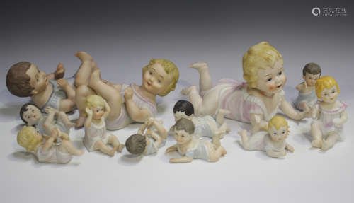 Eleven bisque porcelain piano babies, early 20th century and...