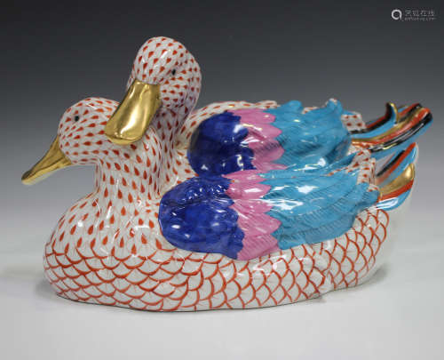 A large Herend porcelain figure group of two ducks with iron...