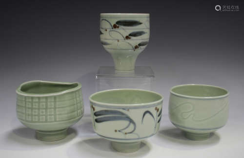Four Derek Clarkson studio porcelain footed bowls, each deco...