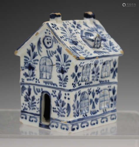 A Dutch Delft model of a house, late 19th century, the two-s...