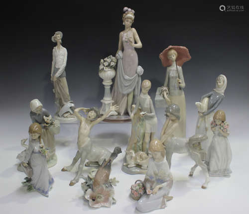 Twelve Lladro porcelain figures, including A Touch of Class,...