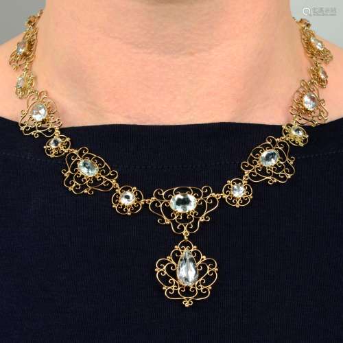 An early 20th century Arts & Crafts gold aquamarine necklace...