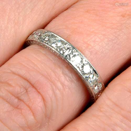 A brilliant-cut diamond full eternity ring.Estimated total d...