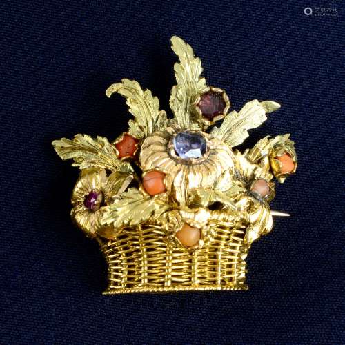 A gold gem-set floral basket brooch.Length 2.9cms.