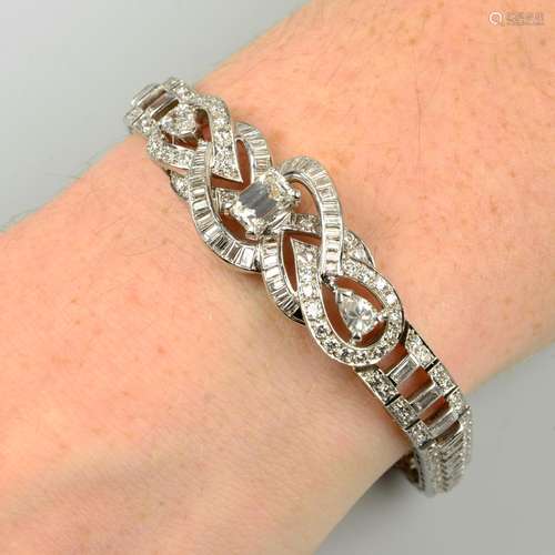 A mid 20th century platinum vari-cut diamond bracelet.Princi...