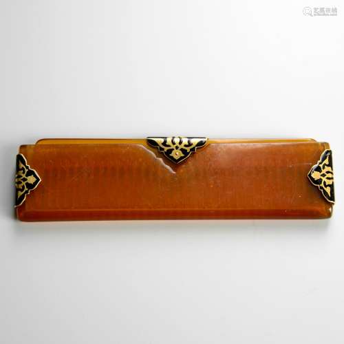 A late 19th century plastic comb, with gold and enamel mount...