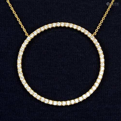 A diamond circular pendant, on chain.