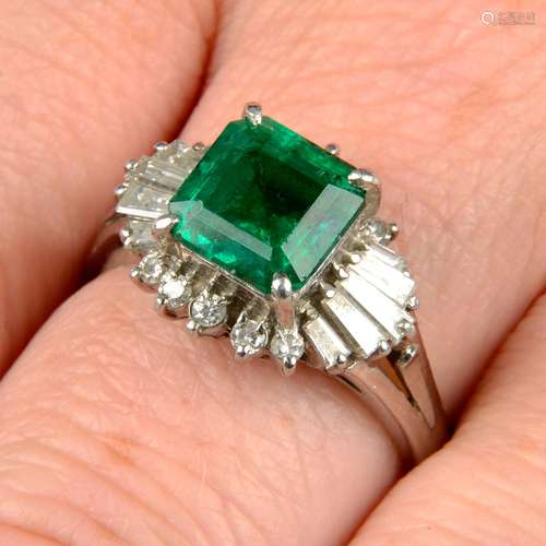 An emerald and vari-cut diamond dress ring.