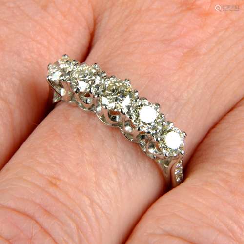 A slightly graduated brilliant-cut diamond five-stone ring,