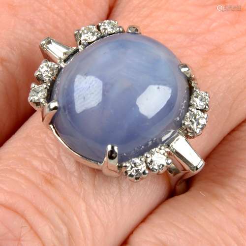 A star sapphire and diamond ring.