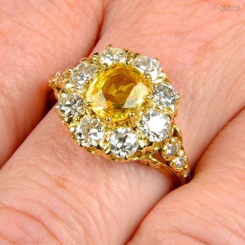 A yellow sapphire and old-cut diamond cluster ring.Sapphire ...