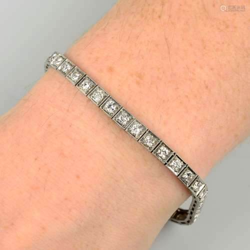A brilliant-cut diamond line bracelet.Estimated total diamon...