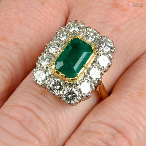 An emerald and diamond ring.Emerald calculated weight 1.51ct...