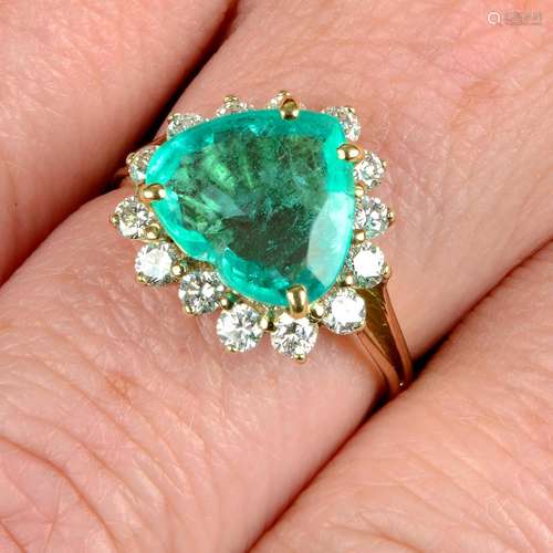 A heart-shape emerald and brilliant-cut diamond cluster ring...