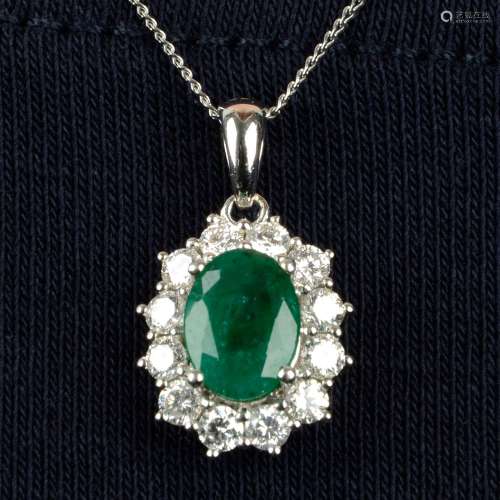 An 18ct gold emerald and brilliant-cut diamond cluster penda...