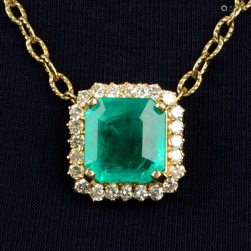 An emerald and diamond cluster pendant, with 9ct gold chain.