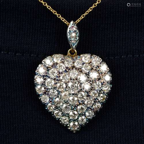 A pavé-set diamond heart pendant,