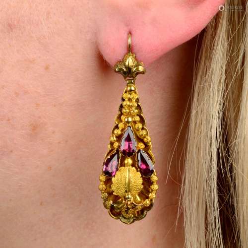 A pair of early 19th century gold garnet earrings.