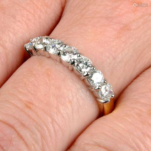 An 18ct gold brilliant-cut diamond seven-stone band ring,