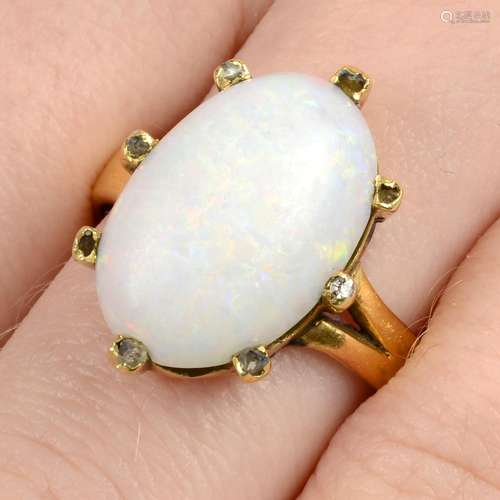 An opal and diamond dress ring.