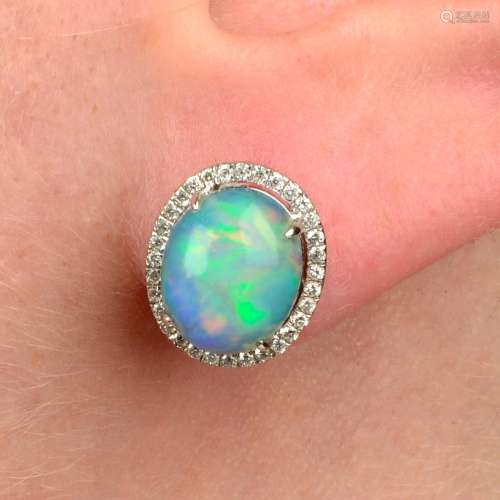 A pair of opal cabochon and brilliant-cut diamond cluster ea...