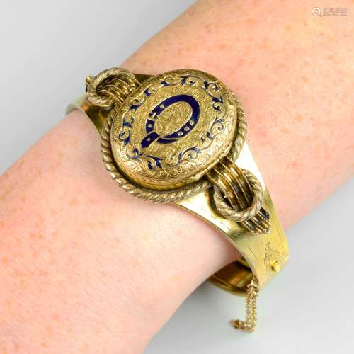 A late 19th century gold and blue enamel hinged locket bangl...