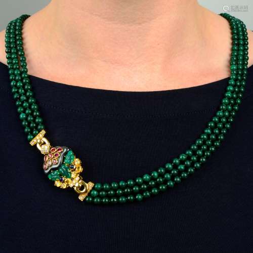 A malachite bead three-row necklace,